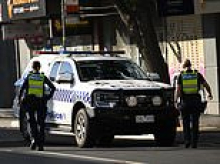 Stay inside warning issued as heavily armed police surround Melbourne home and lockdown street