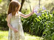 VANESSA TAIT: Why this picture of sweet 'hippy child' Lilibet with her bare feet and hair flowing free makes my heart break for George, Charlotte and Louis. Maybe Meghan got it right after all...