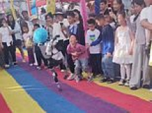 Out-of-control robot karate kicks a child in the stomach while performing martial arts