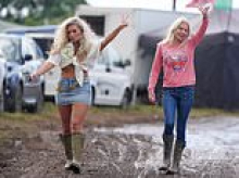 Travellers enjoy the sunshine at Appleby Horse Fair as police seize 99 dangerous 'pyramid rings' destined for Europe's biggest gathering of gypsies