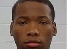 Killer teen Karmelo Anthony appears stone-faced in new mugshot after being sentenced to 35 years in prison for murder of Austin Metcalf