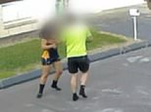 Terrifying moment father and his young daughter flee balaclava-clad gunman who opened fire during afternoon school pickup