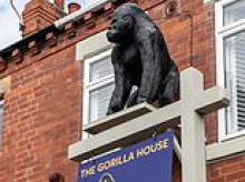 Gorilla will be missed: Homeowner loses battle with council to keep four-foot tall plastic ape on the front of her house