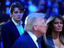 Barron Trump sports new hairstyle as he's seen for the first time in four months towering over mom and dad at UFC event