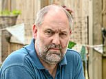 Father is embroiled in furious land row with his neighbours who 'built garden office pod on lawn of his £600,000 home'