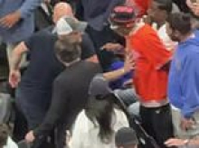 Awkward moment Spike Lee appears to snub Prince Harry as he made solo trip to watch the NBA finals in Texas