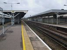 Tube driver was taking personal call when train pulled away with disabled passenger's boarding ramp still attached