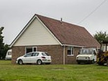 The pensioner who has spent 14 YEARS defying council orders to demolish illegally built £500K home - as he wins another reprieve with court date delayed again