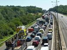 More than 10 people are rushed to hospital for 'heat-related' illnesses after being stranded in traffic on the M25 for HOURS during red alert
