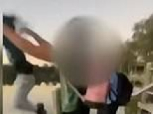 Shocking moment a young boy who can't swim is thrown into a lake prone to blue-green algae outbreaks - sparking a police investigation