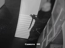 Moment Romanian thieves break into jewellery store from tattoo parlour next door after smashing down wall behind cupboard to steal £40,000 worth of precious gems
