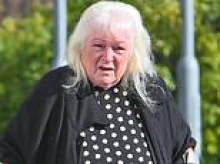 'Neighbour from hell' hit with restraining order after 15-year vendetta against couple - spying on them and throwing rotting dead moles over garden fence