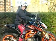 Moment benefits cheat who said he couldn't walk 20 metres is caught riding a motorbike and smoking a cigarette - as he avoids prison for £9,000 fraud