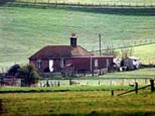 The abandoned house frozen in time where one of Britain's best-known comedians fell to his death from the roof while trying to adjust his TV aerial during a Man Utd game