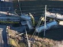 Train derails in small town as emergency services race to clear the wreckage