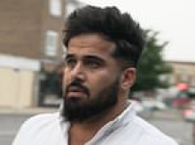 Mini-marts owned by convicted people smuggler who is now seeking asylum in UK are shut down as residents express outrage