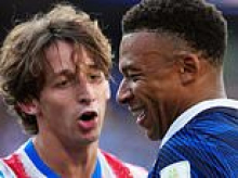 Paraguay's World Cup 'disgrace': Furious BBC pundits savage 'embarrassing' South Americans after last-16 clash descended into chaos with 'dirty' tactics - as Kylian Mbappe hits back with F-bomb response