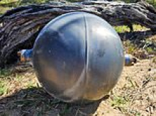Warning is issued after 'potentially hazardous' unidentified objects wash up on Aussie beach