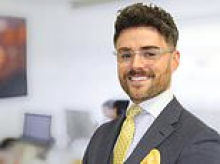 Lawyer is found guilty of impersonating police officer after he rang up Nando's to request their CCTV 'in bid to spy on his ex-girlfriend with her new man'