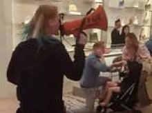 Moment anti-fur activists storm London Dior store in front of shocked families before being thrown out by heroic security guards