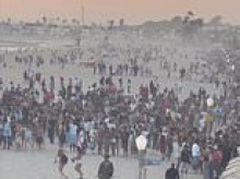 Luxurious beach town descends into riots as 400 are arrested as horse-riding police swarm out-of-control July 4 celebrations
