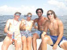 Haunting photos show promising young footballer, 18, enjoying July 4 boating day with friends...hours later, he was dead