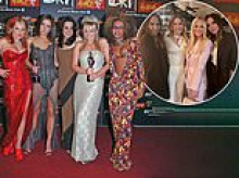 Mel C reveals she was almost kicked out of the Spice Girls for telling Victoria Beckham to 'f**k off' in a row about hair at the 1996 BRITs
