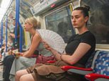 Sadiq Khan fails to roll out any new air conditioned Tube trains for nearly a decade - leaving passengers sweltering in 40C heat