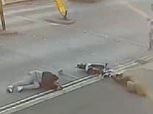 Moment e-scooter rider leaves woman crossing the road seriously injured after ploughing into her before callously riding away - as figures show payouts from crashes reach £110million