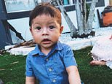Heartbreaking photo shows toddler's navy blue baby Crocs abandoned on driveway after he was struck and killed by Chevy Suburban 'that's usually driven by his mother'