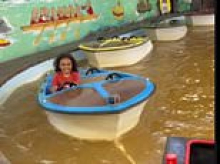 Nauseating video of kids riding boats in brown water at popular theme park sparks concerns