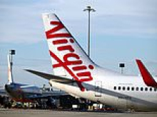 Family of disabled twins sue Virgin after 'bathroom access denied' on Bali flight - as they claim discrimination left lasting trauma
