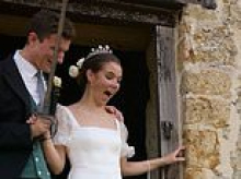 Butter (icing) fingers! Daughter of Boden founder suffers wedding day disaster - after caterers drop extravagant three-tiered cake while presenting it to the bride and groom