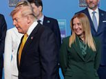 Meloni's reaction says it all as Trump walks right past her at NATO after President sparked outrage in Italy over wild photo claim