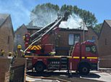 Moment family's roof collapses as newbuild home is destroyed by 'solar panel fire' - just weeks after similar inferno