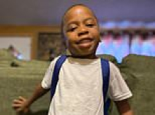 Awful surveillance video shows firework being thrown into window of apartment where it started fire that killed boy, 7