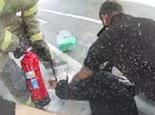 Moment hero police officer stops man from setting himself on fire at Tesco petrol station after he doused himself in fuel