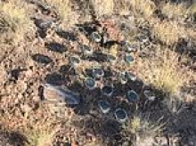 Mystery of why hundreds of speakers were buried in hillside to blare eye-catching message is solved