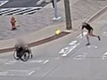 Dystopian moment wheelchair user is struck by Molotov cocktail while crossing road in Oklahoma City
