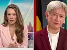 Sky News host accuses Penny Wong of double standards in tense live TV clash about Albanese podcast