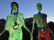 Couple with terrifying 12ft-tall SKELETONS hanging in their front yard score huge win after being ordered to take them down by city officials