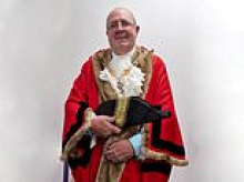 Mayor, 75, was killed in tractor crash after he was blinded by its bright headlights, inquest hears