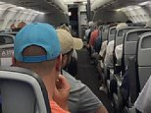 American Airlines says one thing, surprised airport bosses say another after hated carrier left hundreds of passengers stuck on runway for up to THREE HOURS after landing