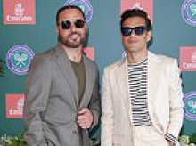Rami Malek and his identical twin brother Sami make a rare appearance together at Wimbledon