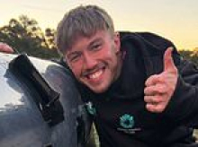 Heartbroken father's moving tribute to son who died after a freak collision with a teammate during a footy match - as hundreds turn out for memorial
