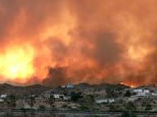 Two British tourists trapped in deadly wildfire in Spain are found alive 'with 40 per cent burns' after police heard 'very faint sound'