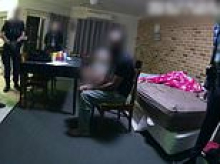 Tense moment former partner of Jana Armstrong is arrested in his dingy room - as he is charged with murder