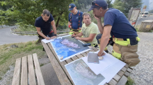 Požar na Planji omejen, gasilci nadaljujejo predvsem gašenje roba požarišča