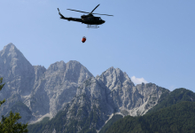 Nočni dež pogasil večino požara na območju Kranjske Gore