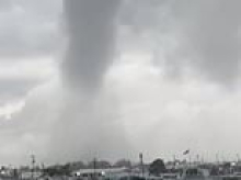 Apocalyptic waterspout in New York as three of America's biggest airports crippled amid TORNADO and flood chaos